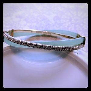 MK CZ bracelet with green detail.